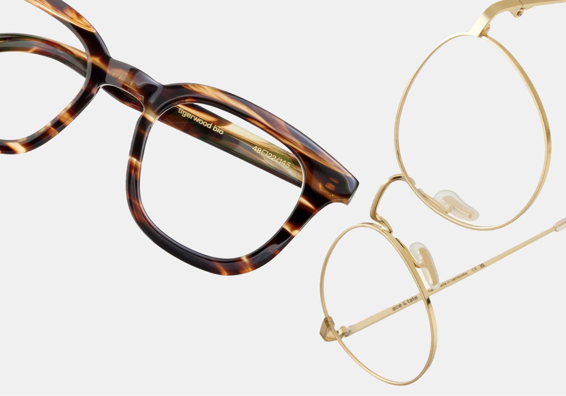 Ace & Tate | Two pairs of glasses showcase classic metal and acetate frames with a clean, refined style.